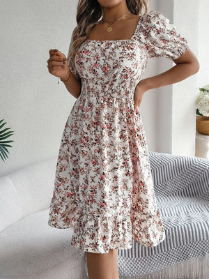 Blommig off-shoulder midiklänning
