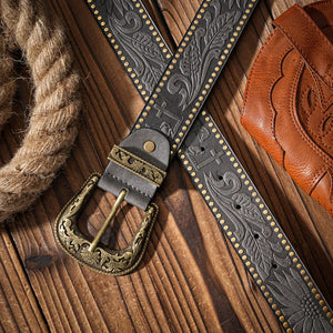 Dam westernbälte med graverat blomspänne