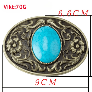 Bältesspänne med turkoser och detaljerat guldmönster