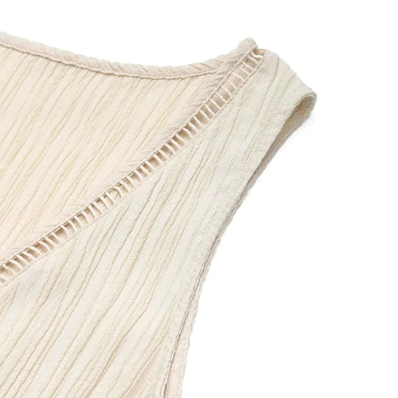Beige klänning med volang