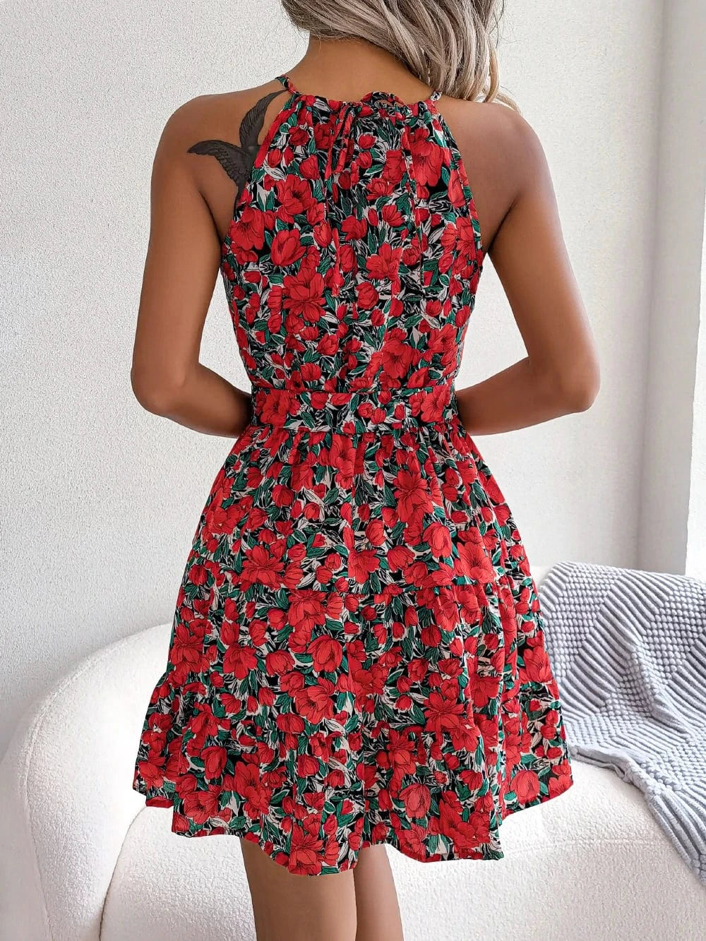 Blommig klänning halterneck