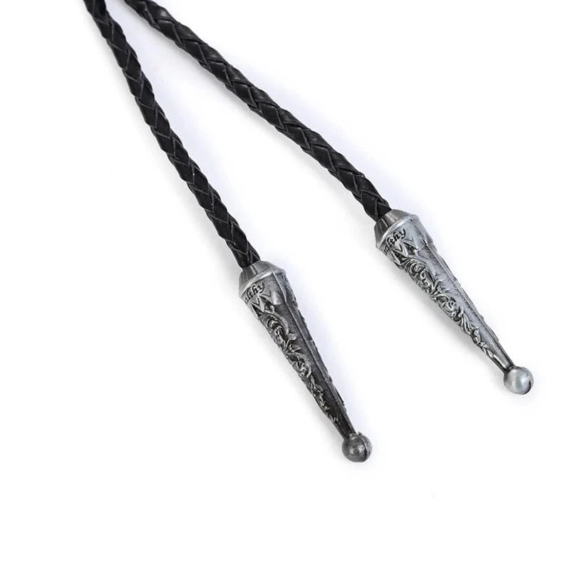 Bolo tie med korslagda revolvrar i metall