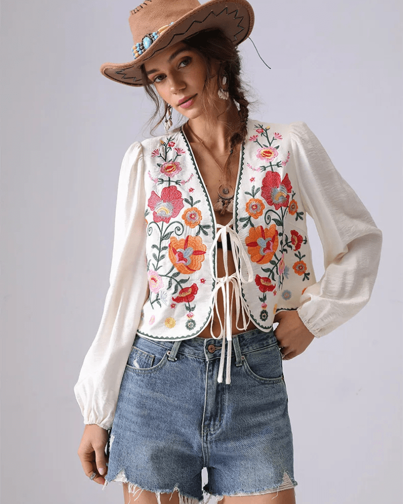 Broderad blus med blommor