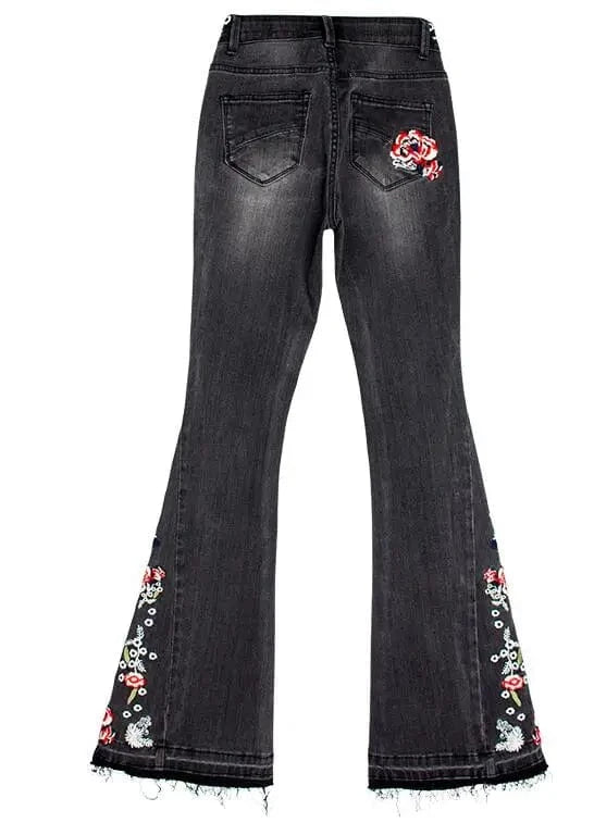 Broderade svarta flare jeans med blommönster