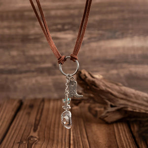 Cowgirl-halsband i mocka med berlocker Brun och silver
