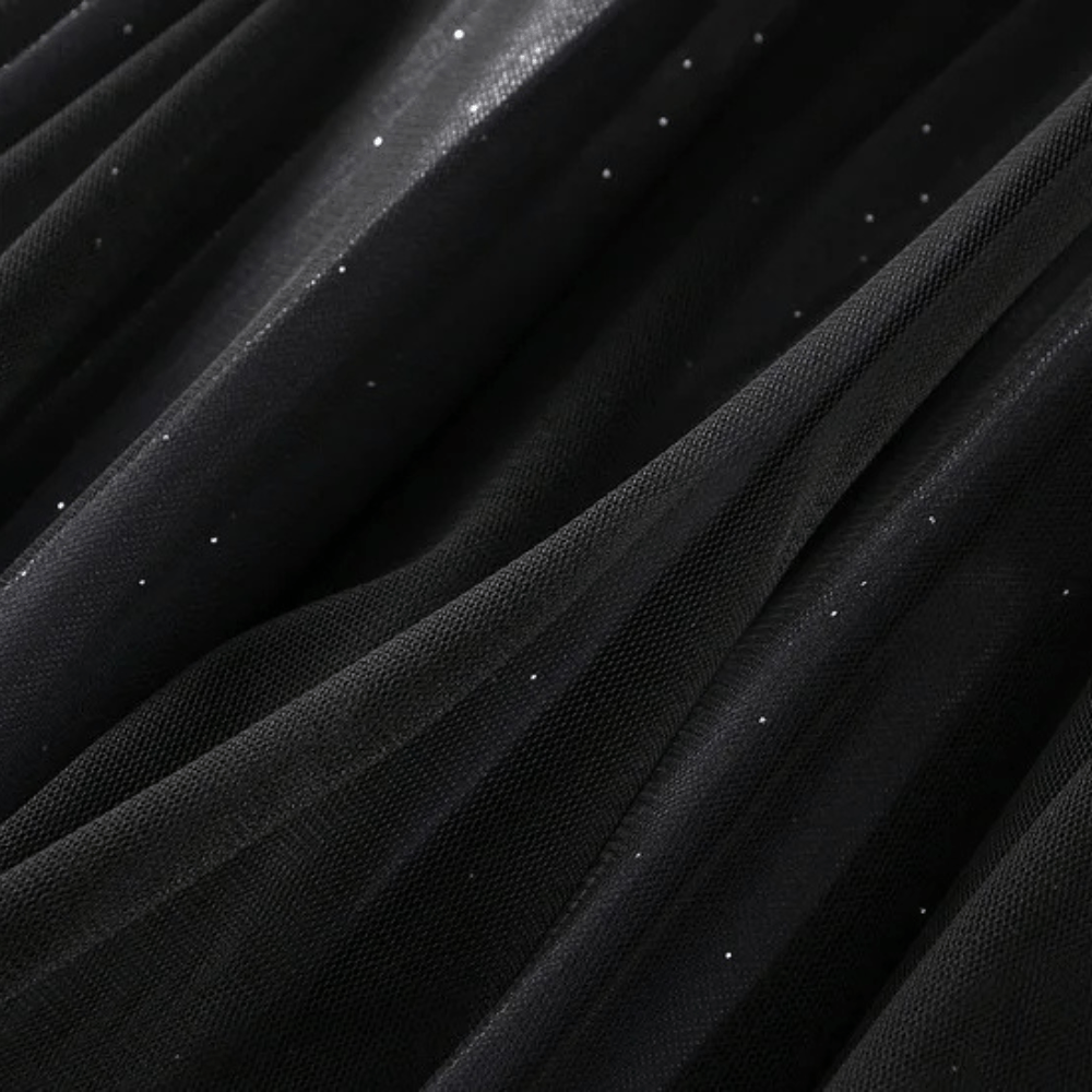 Lång plisserad tyllkjol med glittrig stjärnhimme