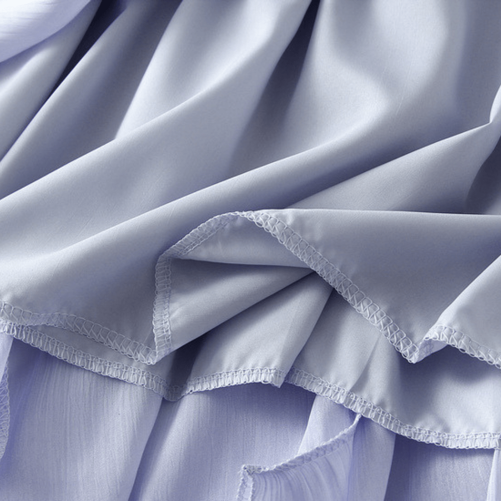 Midikjol med asymmetrisk drapering