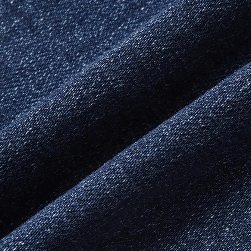 Mörkblå bootcut jeans med broderat hjärta och hästmotiv