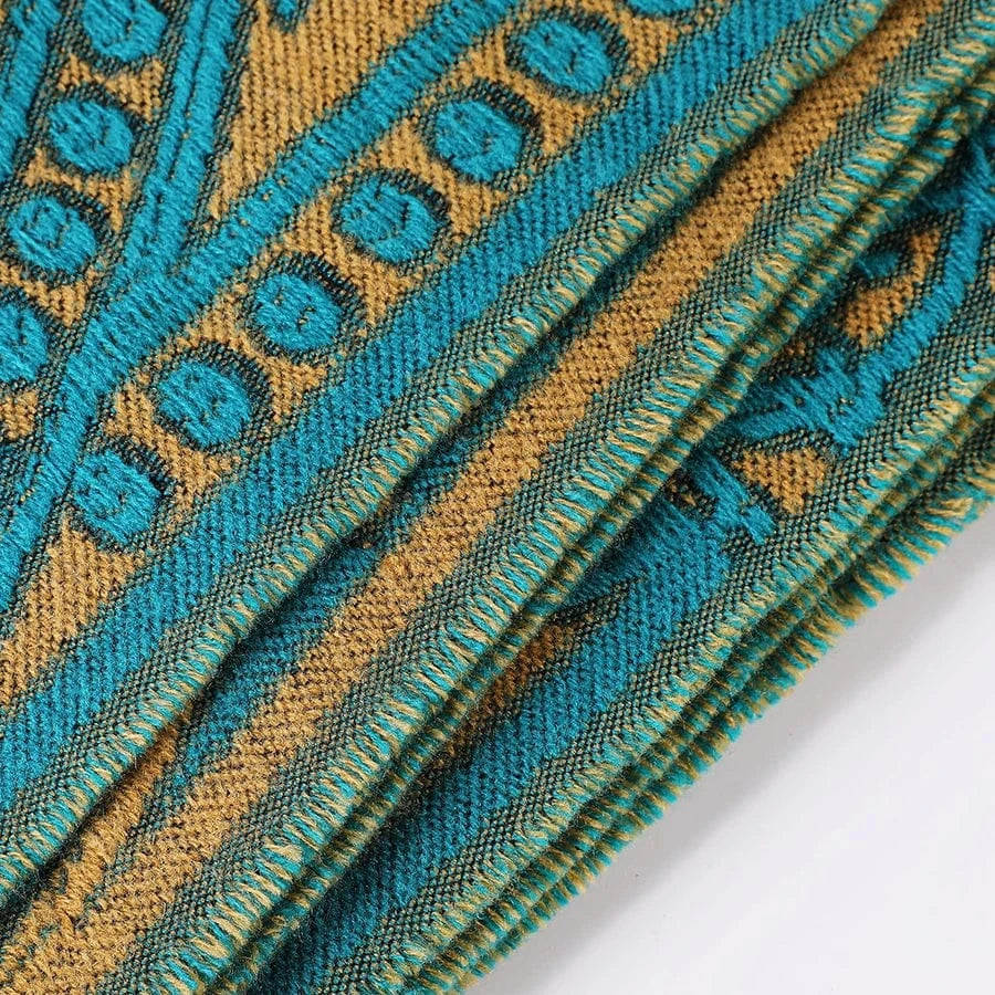 Öppen poncho med blommigt jacquardmönster